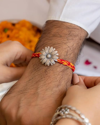 Rakva 92.5 Sterling Silver Rakhi For Brother |Flower Bracelet | 2 in 1 Brooch/Rakhi for Men and Women | With Roli Chawal Tilak for Kids